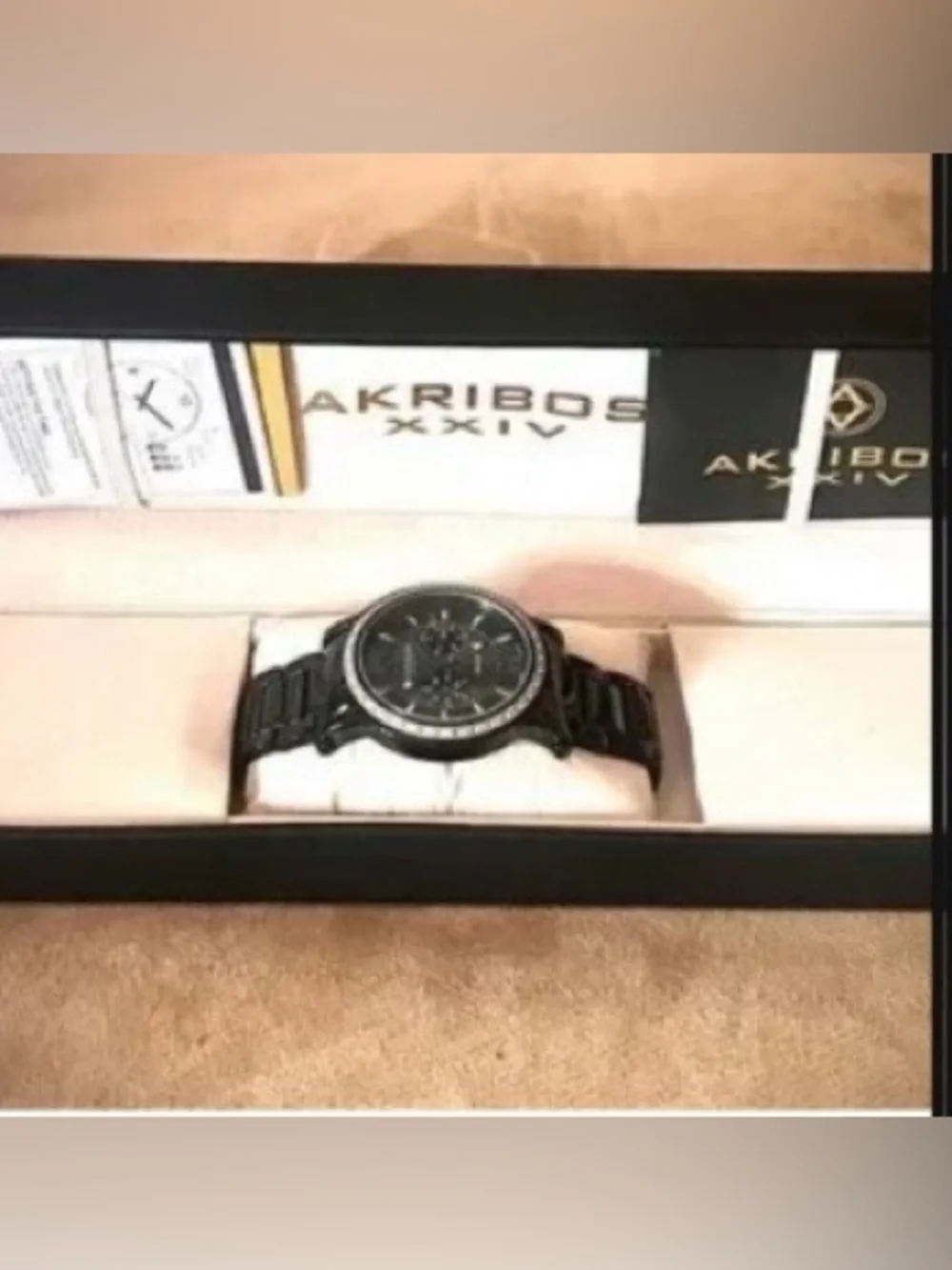 Akribos XXIV Black and Silver Radiant Caseback Watch
